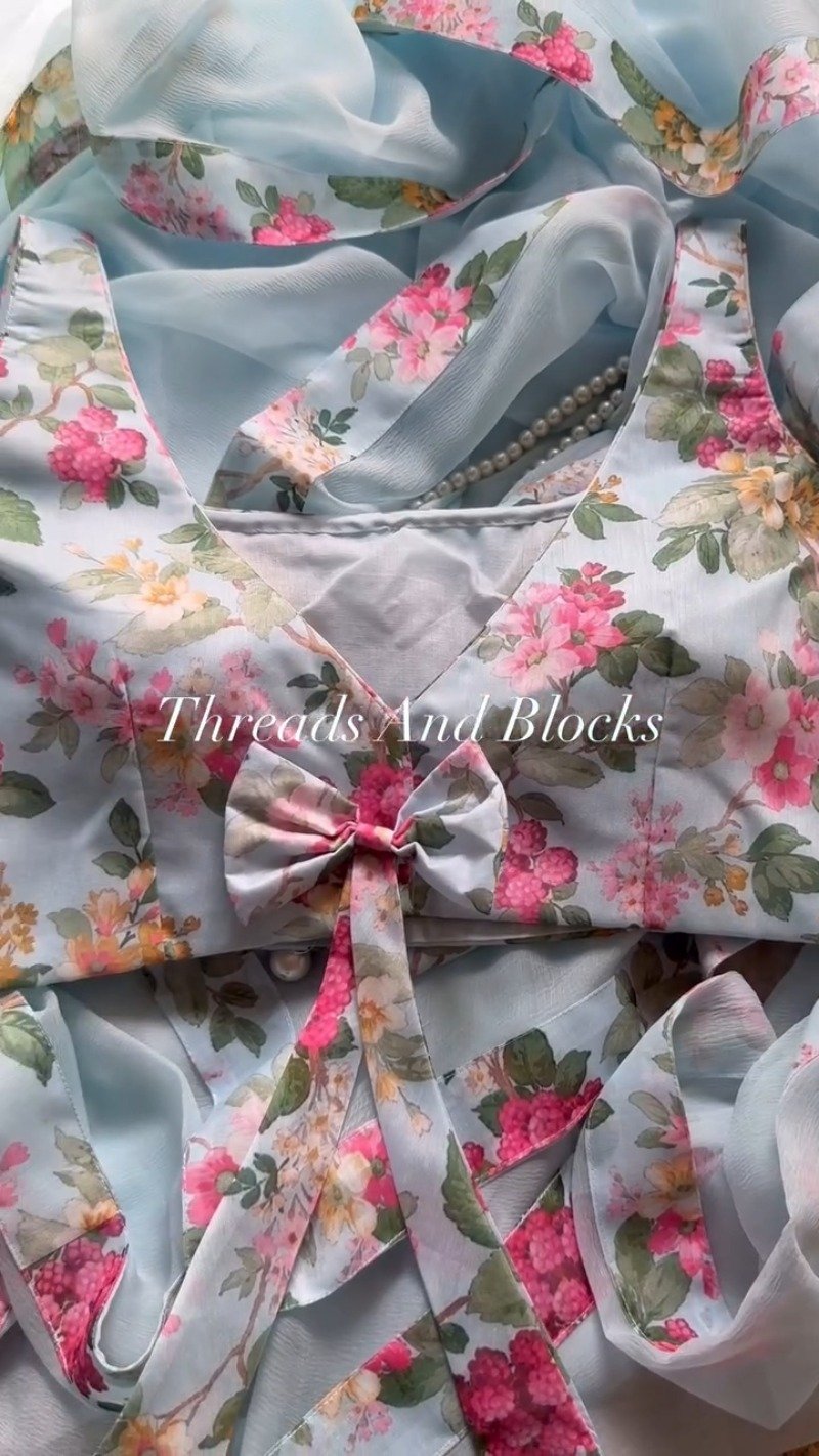Pastel Blue Floral Printed Chiffon Saree with Bow-Detail Blouse