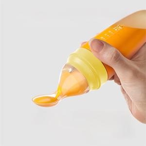 Baby Feeding Bottle with Soft Silicone Spoon Dispenser