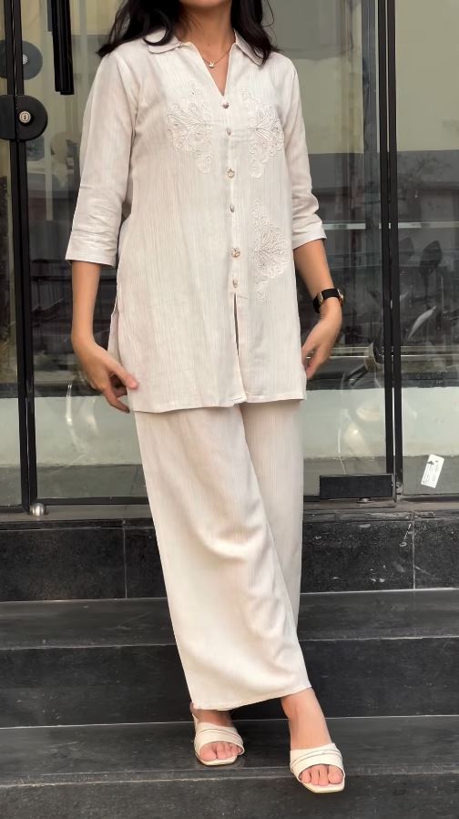 Subtle Elegance Ivory Striped Tunic and Straight-Leg Trousers Co-ord Set