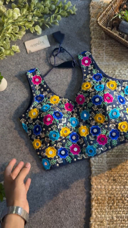 Midnight Blue Floral Mirrorwork Sleeveless Blouse – A Kaleidoscope of Vibrant Embroidery