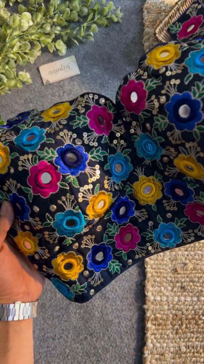 Midnight Blue Floral Mirrorwork Sleeveless Blouse – A Kaleidoscope of Vibrant Embroidery