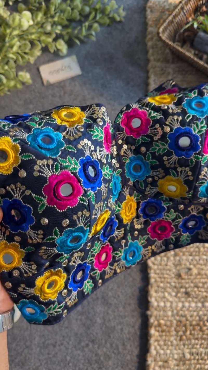 Midnight Blue Floral Mirrorwork Sleeveless Blouse – A Kaleidoscope of Vibrant Embroidery