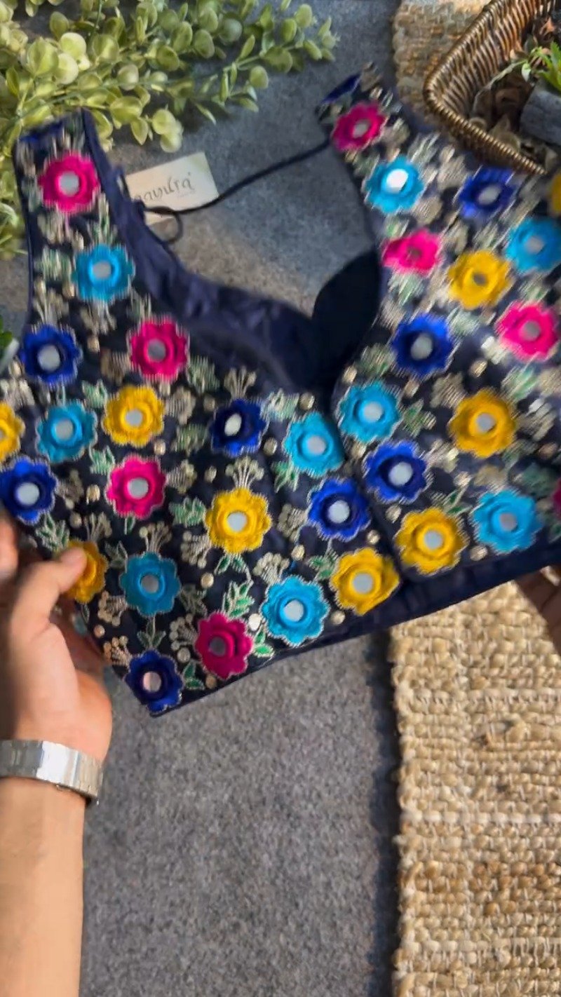 Midnight Blue Floral Mirrorwork Sleeveless Blouse – A Kaleidoscope of Vibrant Embroidery