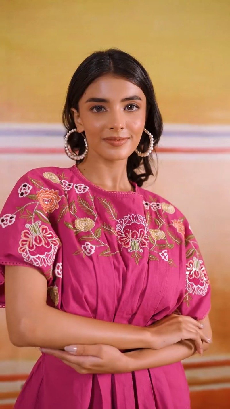 Vibrant Fuchsia Peplum Kurta Set with Floral Embroidery