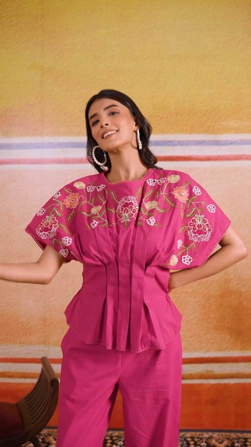 Vibrant Fuchsia Peplum Kurta Set with Floral Embroidery
