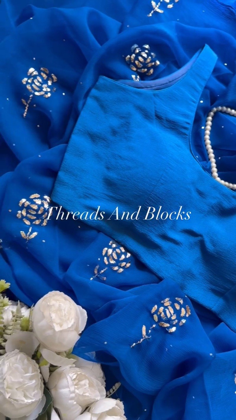 Royal Azure Chiffon Saree with Hand-Embellished Floral Motif – Available in Royal Blue