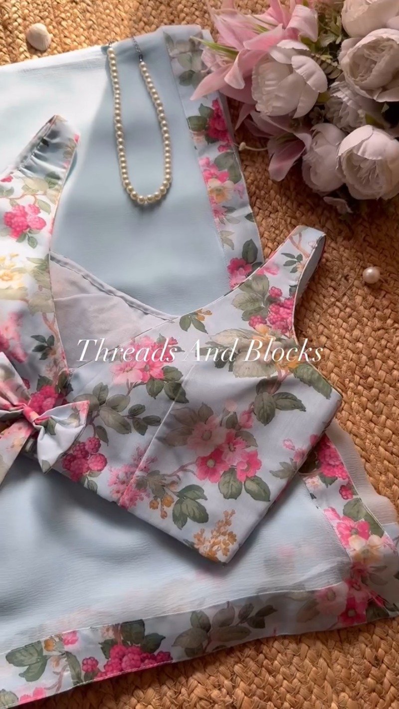 Pastel Blue Floral Printed Chiffon Saree with Bow-Detail Blouse