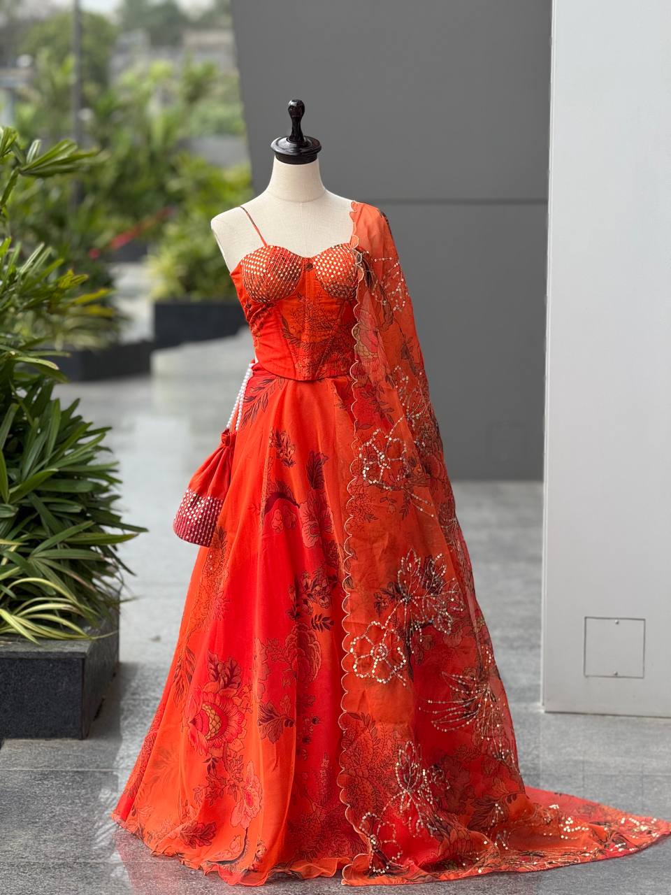 Elegant Orange Color Organza Lehenga Choli Set With Designer Batwa