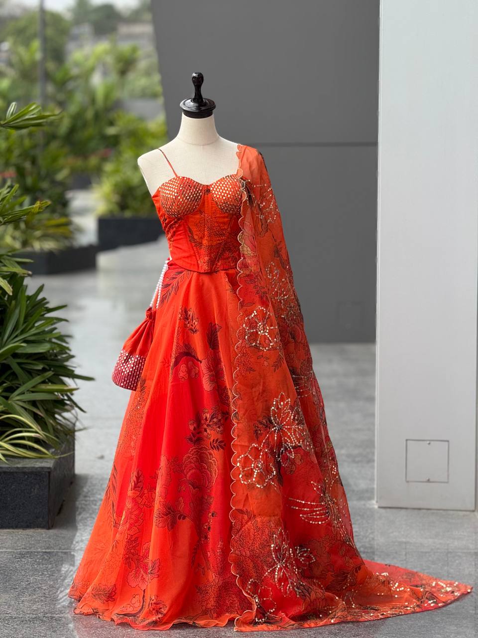 Elegant Orange Color Organza Lehenga Choli Set With Designer Batwa