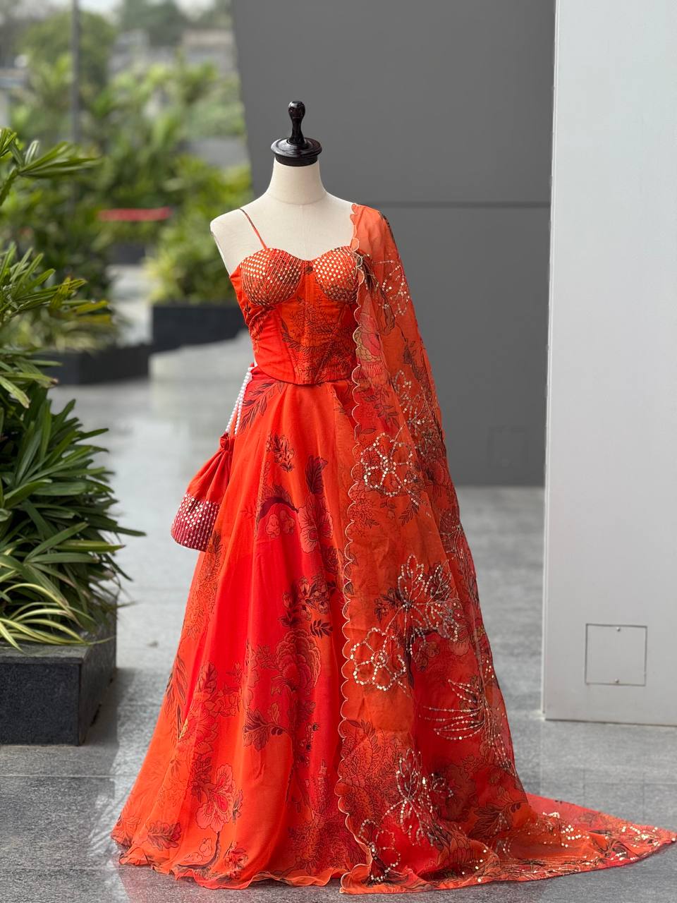 Elegant Orange Color Organza Lehenga Choli Set With Designer Batwa