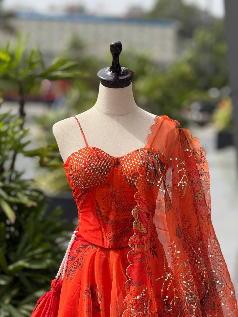 Elegant Orange Color Organza Lehenga Choli Set With Designer Batwa