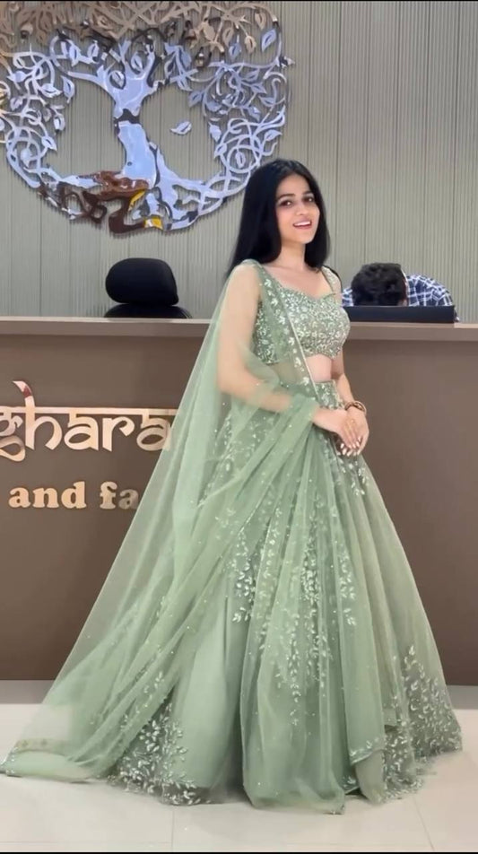 Pista Green Soft Butterfly Net Heavily Embroidered Lehenga Choli Set