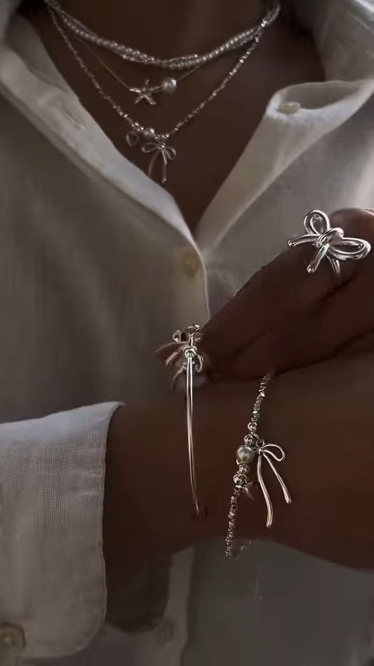 Layered Pearl & Bow Charm Necklace