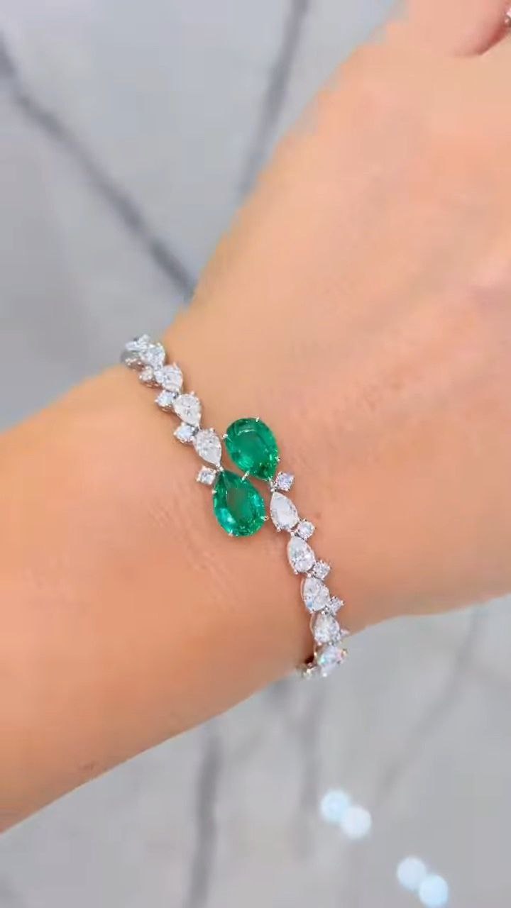 Dual Emerald Oval Stone Diamond-Style Ring