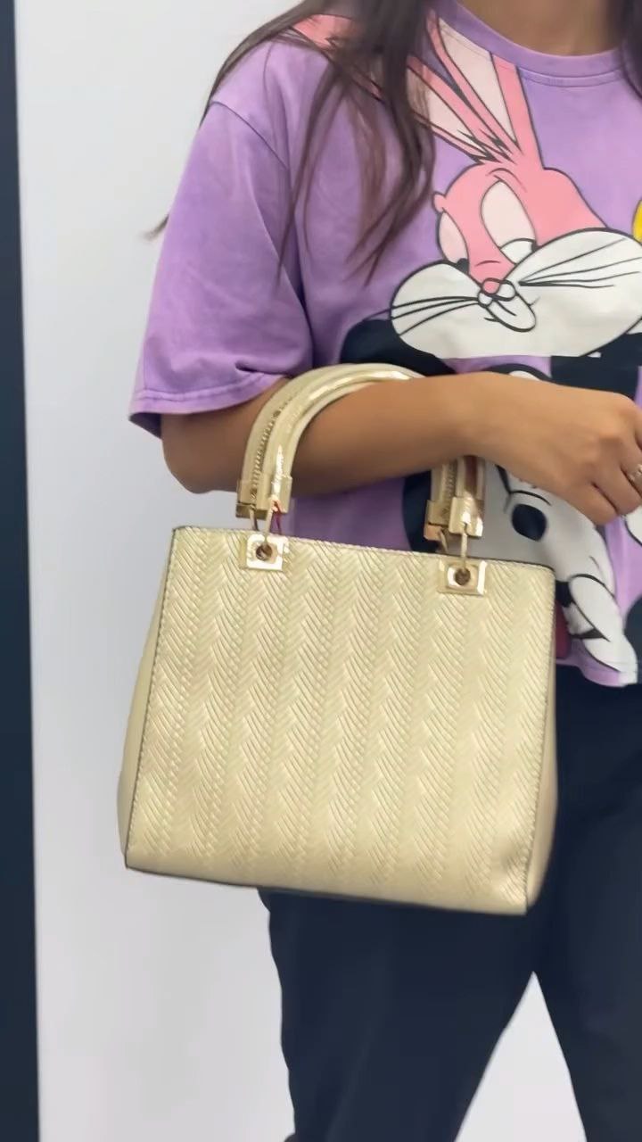 Elegant Gold Textured Handbag with Dual Handles