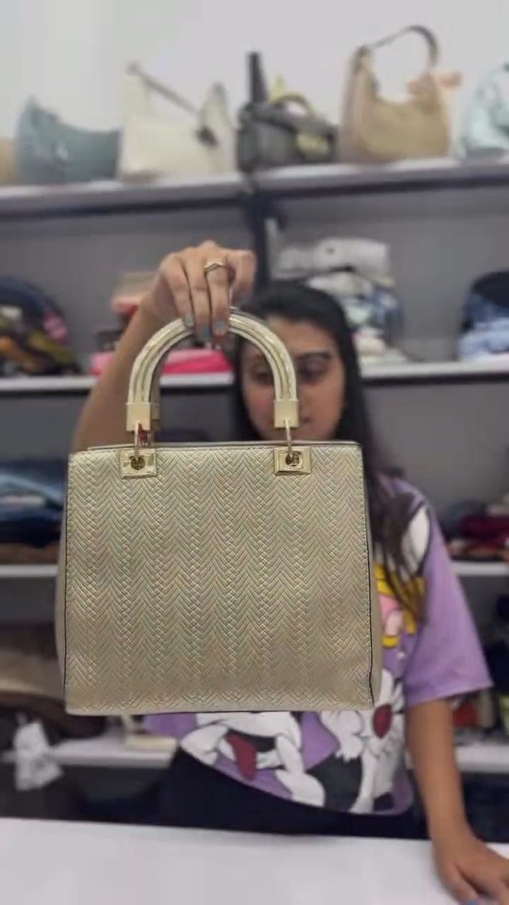 Elegant Gold Textured Handbag with Dual Handles