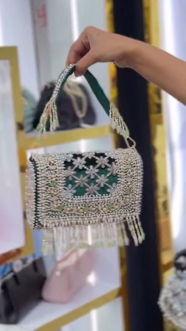 Pearl-Embellished Potli Handbag with Tassel Handle