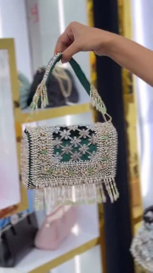 Pearl-Embellished Potli Handbag with Tassel Handle