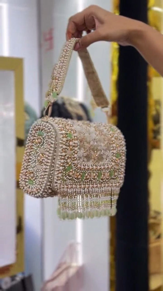 Pearl-Embellished Potli Handbag with Tassel Handle
