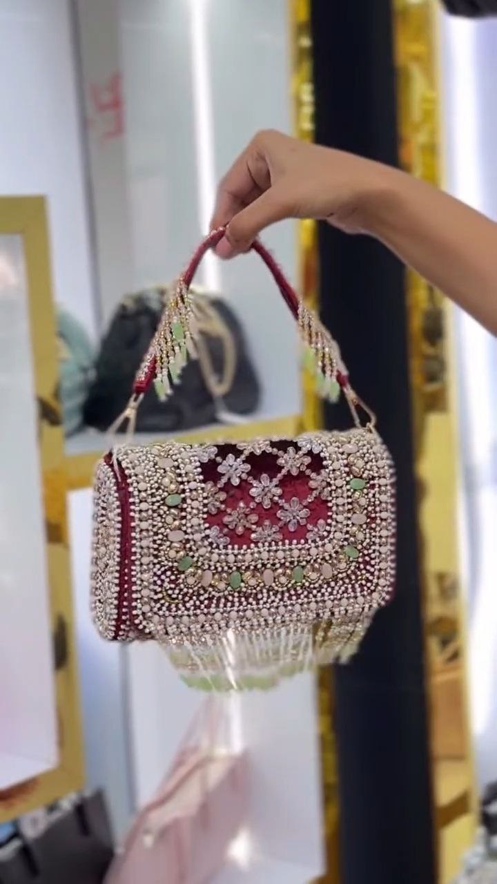 Pearl-Embellished Potli Handbag with Tassel Handle
