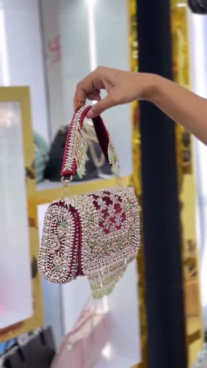Pearl-Embellished Potli Handbag with Tassel Handle