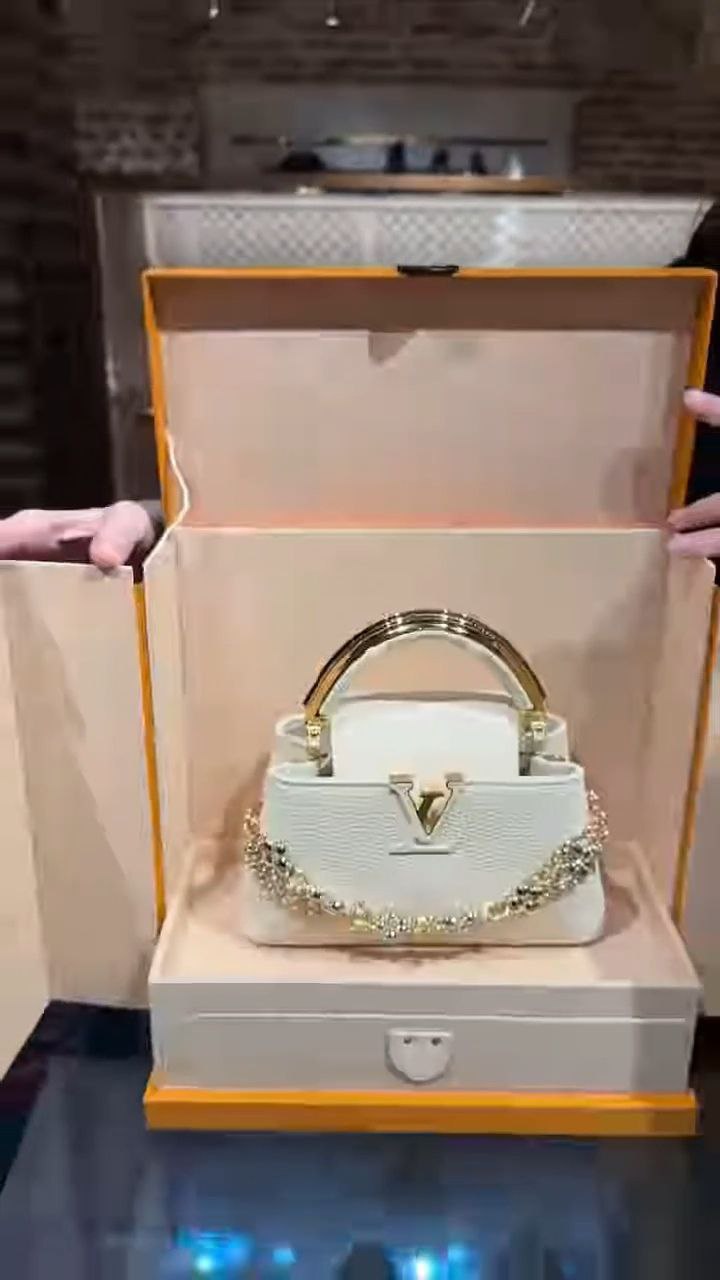 Elegant Mini Top-Handle Handbag with Decorative Chain