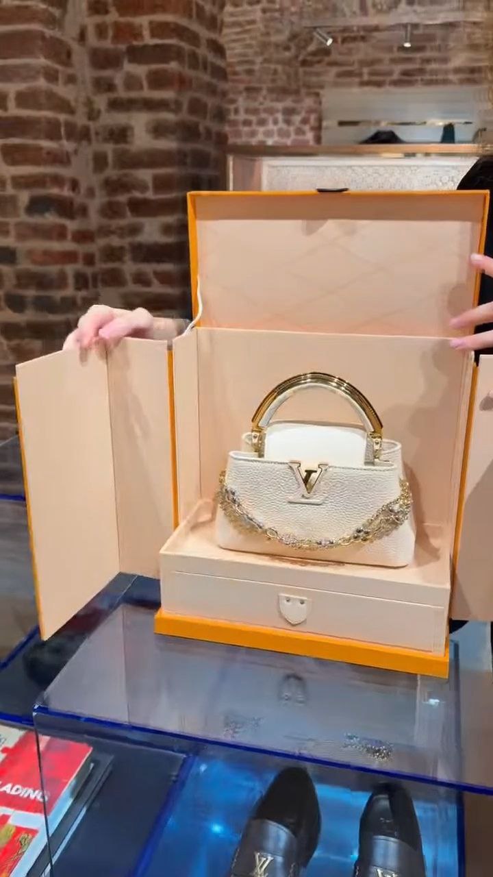Elegant Mini Top-Handle Handbag with Decorative Chain