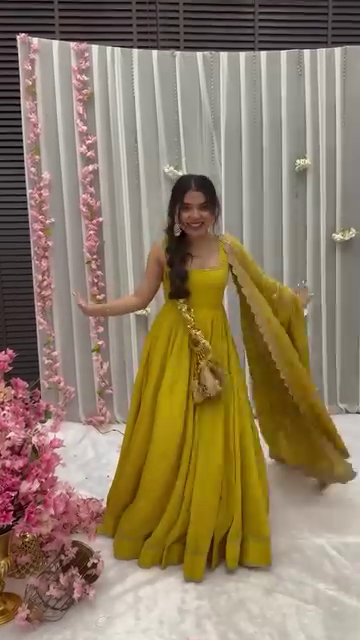 Mustard Yellow Solid Flared Gown Set with Gota Tassels and Banarasi Dupatta